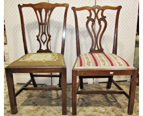 Two Georgian Chippendale style dining chairs, varying design with pierced splats over drop in upholstered tapestry seats rais