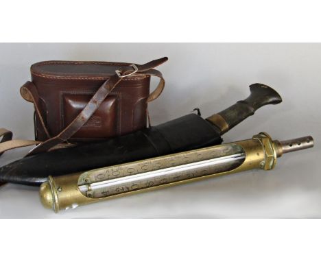 A Nepalese Kukri knife in a black leather sheath, a Zeiss Ikon camera and a brass immersion thermometer (af) made by Russell 