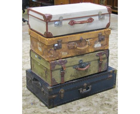 A vintage Garstin blue fibre and re-inforced wardrobe cabin trunk with brass fittings together with three further leather and
