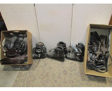 A pair of vintage skis and poles with marker automatic fittings, together with various pairs of boots and ice skates (collect