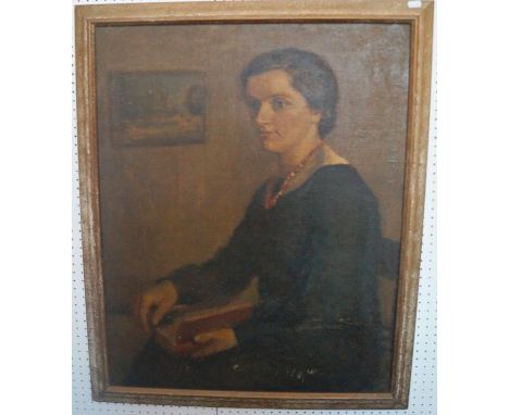 20th century school - Three quarter length portrait of a young woman seated and holding a book, oil on board, no signature vi