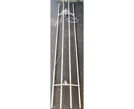 A vintage rise and fall clothes airer with painted slats and cast alloy fixings, 227 cm long 