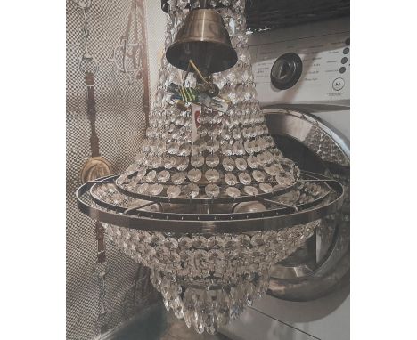 A cut glass hanging ceiling light, circular form with trailing festoons (wired), approximate height 50 cm 