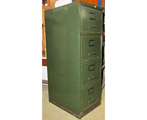 A vintage floorstanding steel four drawer filing cabinet in original green painted colourway with lined detail, the back bear