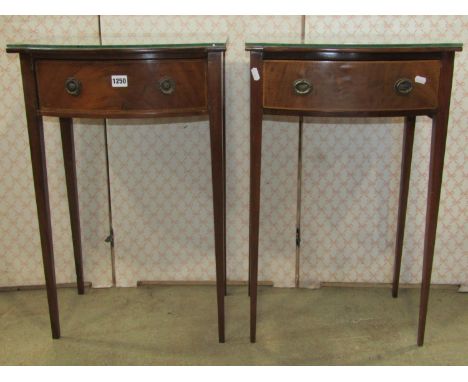 A matched pair of Edwardian Georgian style bow fronted side/lamp tables, each fitted with a frieze drawer with inlaid detail 