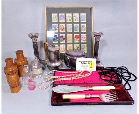 A mixed lot comprising a pair of silver plated candlesticks, silver plated tea caddy, various plated cutlery sets to include 