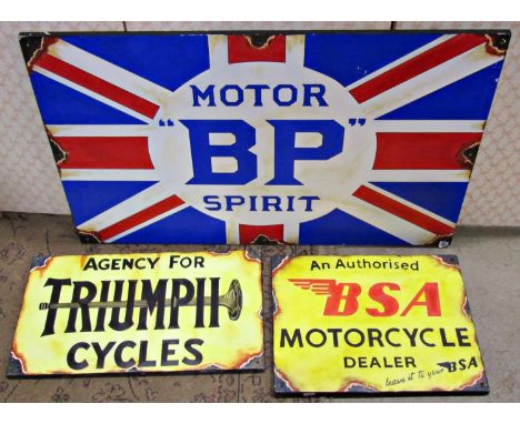 Three vintage style advertising signs 'BSA', 'Triumph motorcycles' and 'BP motor Spirit' (hand painted on fibre board) varyin