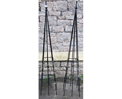 A pair of contemporary coated light steel obelisks, 136cm high 