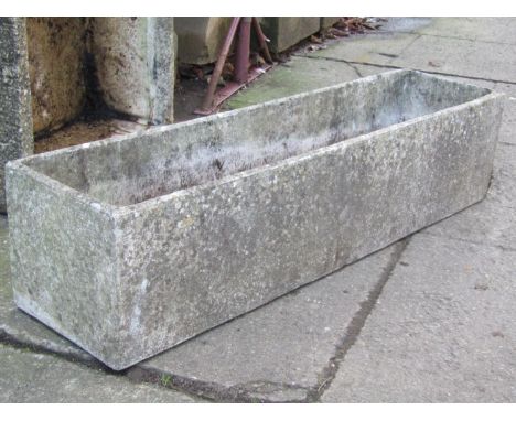 A reclaimed shallow garden trough of rectangular form, with simulated textured/rough hewn finish, 74cm long x 55cm wide x 22c