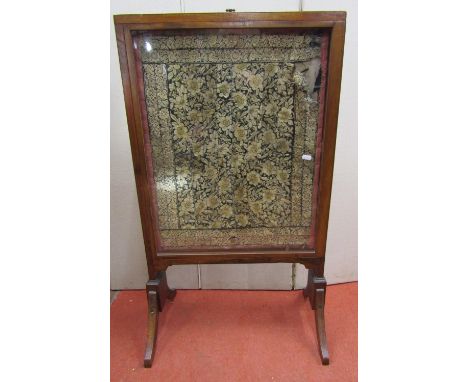 A 19th century firescreen with slide glazed wings, set on swept supports, 58cm wide when closed, 150cm wide fully open, the c