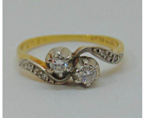 18ct gold and platinum diamond crossover ring, size K, 2.8g 