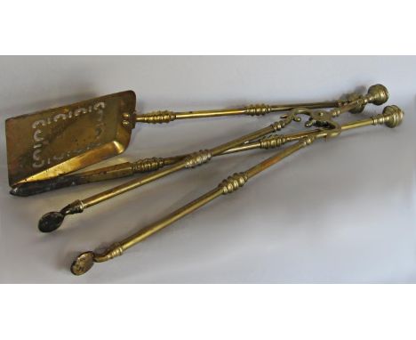 Three Victorian brass fire tools, a poker, shovel and tongs (3) 