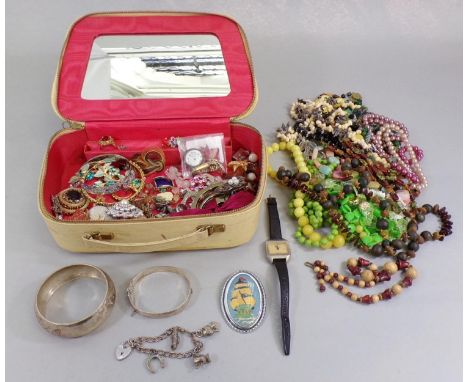 Collection of vintage costume jewellery to include a silver charm bracelet, hinged silver bangle with floral detail plus a fu