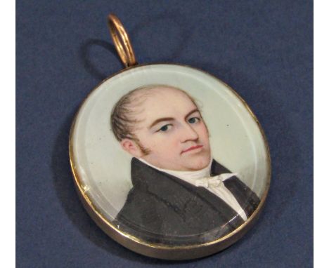 Mid 19th century portrait miniature, gentleman in a black jacket and white collar, to the reverse a woven hair panel with add