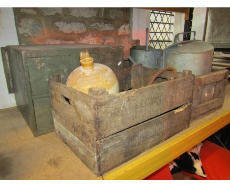 A vintage steel four drawer index filing cabinet, a stoneware flagon stamped Hulbert &amp; Co, Highworth, two wooden crates, 