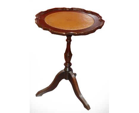 A TRIPOD WINE TABLE WITH LEATHER INLET TOP 