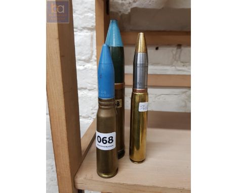 3 LARGE SPENT BULLET SHELLS 