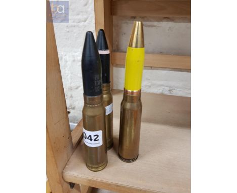 3 LARGE SPENT BULLET SHELLS 