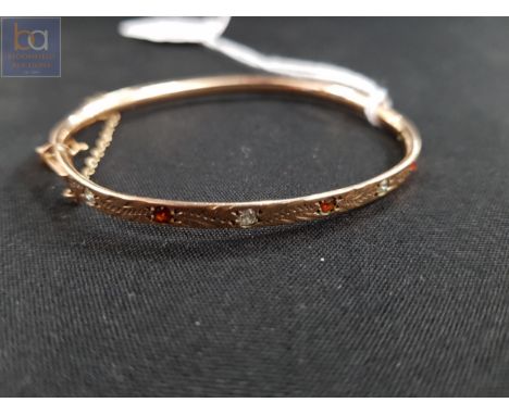 HINGED BANGLE SET WITH GARNET AND WHITE SAPPHIRE 