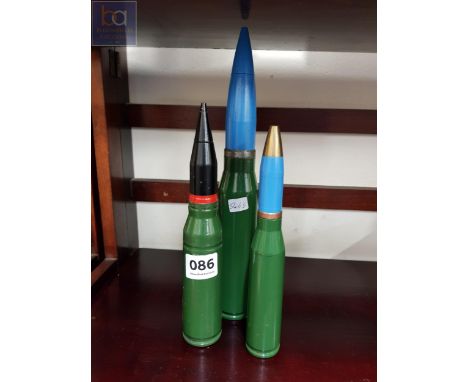 3 LARGE SPENT BULLET SHELLS 