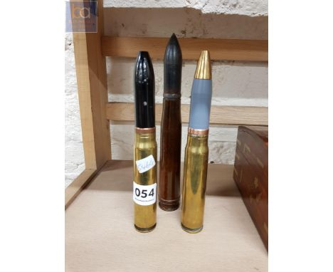 3 LARGE SPENT BULLET SHELLS 