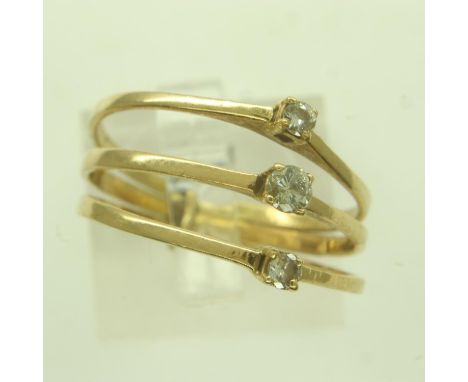 A continental gold suite of three rings, attached to form a trilogy ring, each set with diamond, size R, 3.4g. UK P&amp;P Gro