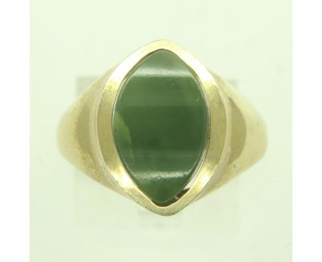 A 9ct gold signet ring, set with a shaped panel of jade, size R, 5.5g. UK P&amp;P Group 0 (£6+VAT for the first lot and £1+VA