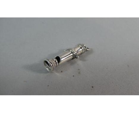 A Miniature Silver Whistle Charm in the Form of a Ships Cannon 