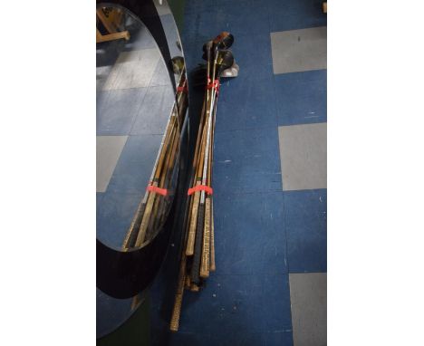 A Collection of Various Vintage Golf Clubs Including Wooden Shafted Examples 