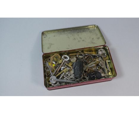 A Vintage Chocolate Vienna Tin Containing Various Door and Cabinet Keys 