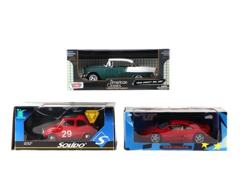 Three 1/18 scale diecast vehicles comprising Prestige Fiat 500, Chevrolet Bell Air and UT Models Ferrari F355 Berlinetta, all