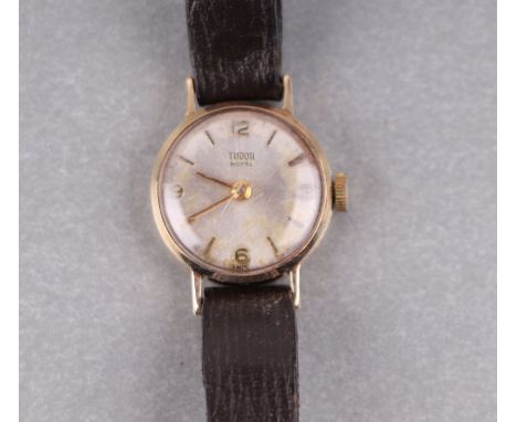 A Tudor Royal 9ct gold ladies wristwatch, the silvered dial with Arabic numerals at 12, 6, 3 and 9 0'clock.