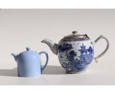 A Chinese blue &amp; white teapot decorated with a river landscape scene, 14cms high; together with a Chinese monochrome teap