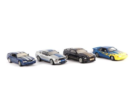 Four 1/18 scale Ford Mustang diecast cars including Universal Models 1994 Mustang, 2001 GMP, 2008 Shelby GT500KR and 2006 She