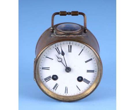 A Victorian brass cased mantle clock, the white enamel dial with Roman numerals and the movement striking on a bell, 10cms di