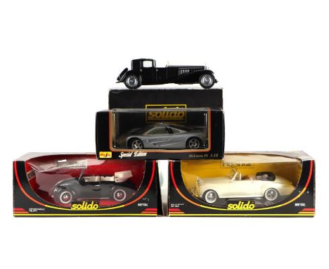 Four Solido 1/18 scale diecast metal cars comprising Bugatti Royale, Maclaren F1, Rolls Royce Drophead Coupe and VW Coccinell