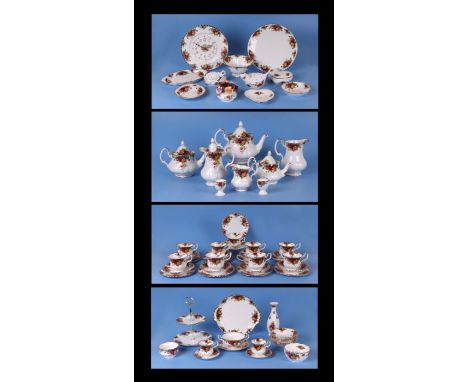 A large quantity of Royal Albert Old Country Roses pattern tea wares to include cake stand, teapots, tea cups and a wall cloc