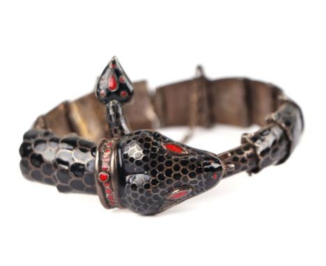 A Margot de Taxco mid century silver and black enamel articulated bracelet.Condition ReportSome pitting and marks to the enam