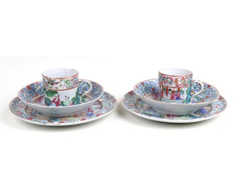 Two 19th century Chinese famille rose trios, cup, saucer and side plate, decorated with figures on a terrace, the side plate 