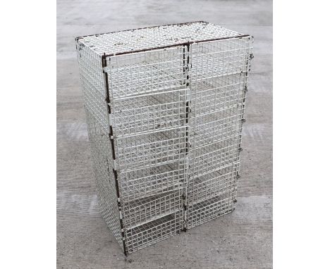 A vintage wirework twelve-division postal pigeon hole / shoe rack, 65cms wide.