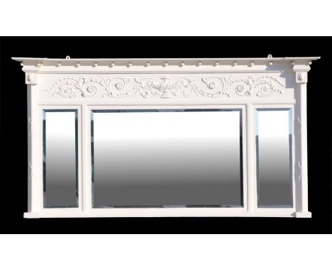 A Victorian painted triptych overmantle mirror with bevelled edge plates, 140cms wide.
