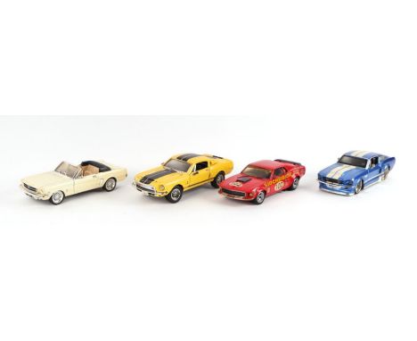 Four 1/24 scale Ford Mustang diecast cars including Maisto 1967 Ford Mustang GT, 68 Shelby GT500 and others (4).