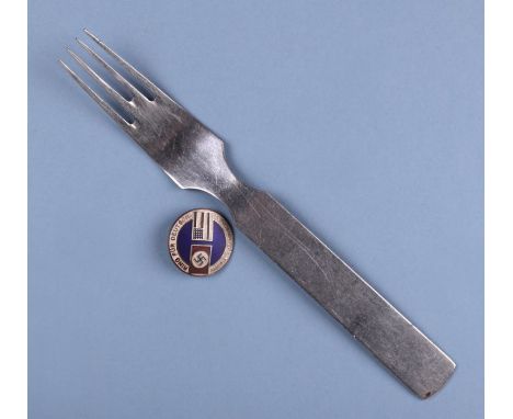 A 1930's Nazi Third Reich / American Friendship enamel badge; together with a German fork stamped with an Eagle &amp; Swastik