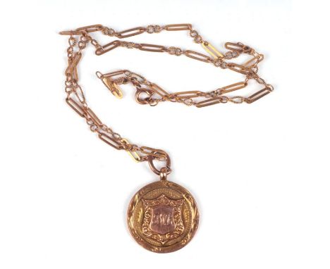 A 9ct gold fob on a 9ct gold fancy link necklace, 7g.