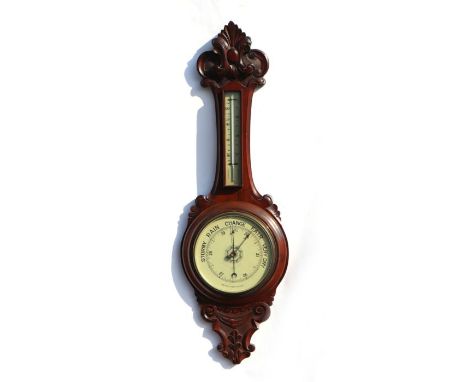 A late 19th century walnut cased barometer thermometer signed 'Rand, London'.
