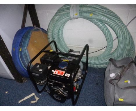 A GASOLINE UP 168 6.5 HP ENGINE/WATER PUMP, together with associated hose and pipe (3)