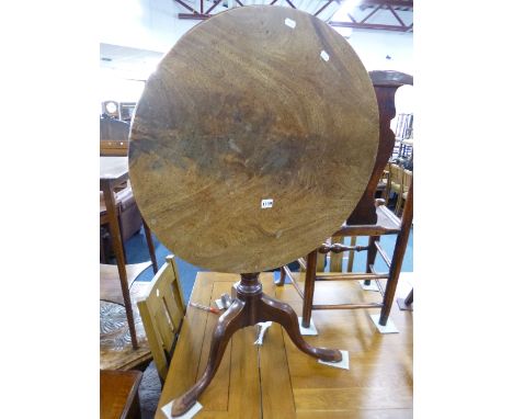 A 19TH CENTURY MAHOGANY CIRCULAR TILT TOP TRIPOD TABLE, approximate size diameter 68cm x height 64cm