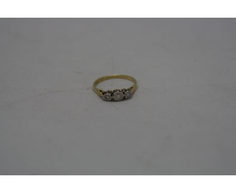 AN 18CT THREE STONE DIAMOND DRESS RING, ring size K, approximate weight 1.9 grams