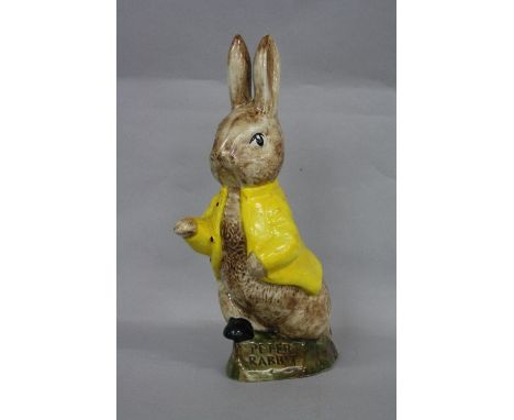 A LARGE SYLVAC WARE 'PETER RABBIT' FIGURE, wearing yellow jacket, height approximately 34cm