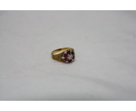 AN 18CT RUBY AND DIAMOND CLUSTER RING, ring size Q, approximate weight 5.9 grams